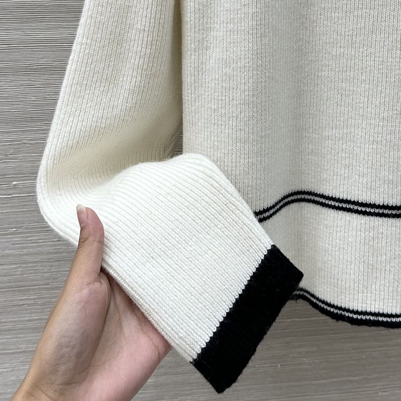 Ch**el sweaters